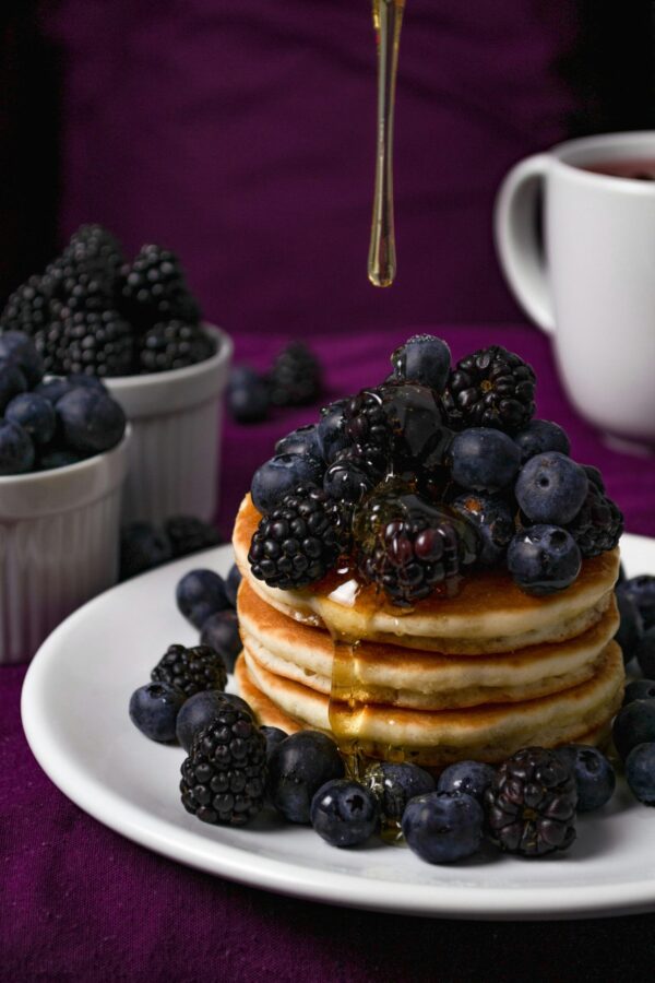 Pancakes With Black Berries on White Ceramic Plate